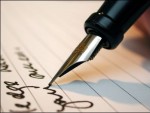 man writing a contract