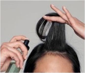 Apply hair thickening spray