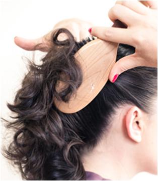 Sweep all hair to the back