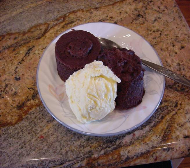 Coffee Cup Chocolate Cake served with a scoop of ice cream