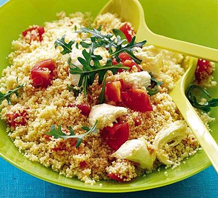 Tossing couscous salad