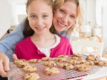 Girl serving cookies