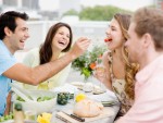 Couples enjoying party on balcony