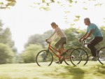 Couple riding bicycles together