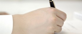 Person writing down