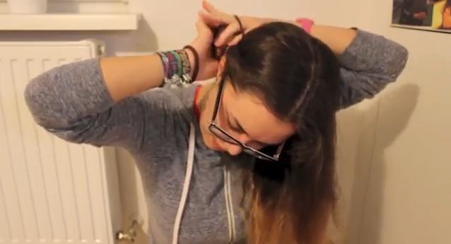 Girl tying hair
