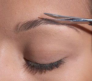 Trim Long Eyebrow Hairs After Waxing