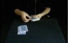 Cards on table with performer counting