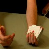 Fingers on Bottom Card