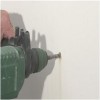 make a hole with electric drill