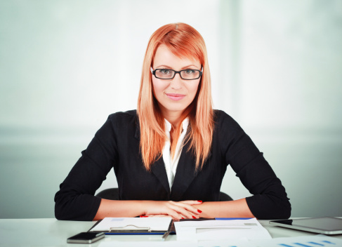 Woman sitting in meeting