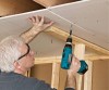 Install screws on drywall