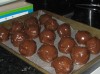 Placing the chocolate balls in the tray