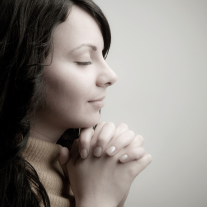 Girl praying to God