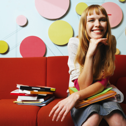 Teenager sitting on a sofa