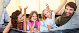Family enjoying in a camp