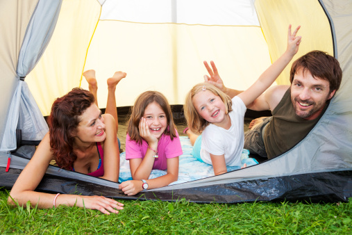 Family enjoying in a camp