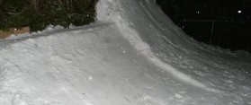 Backyard snowboard park jump