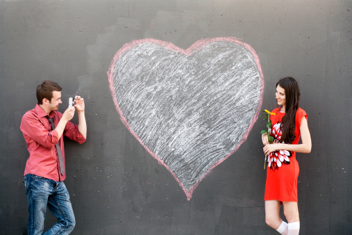 Couple posing with heart