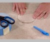 Patching damaged carpeting