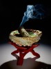 A burning sage stick