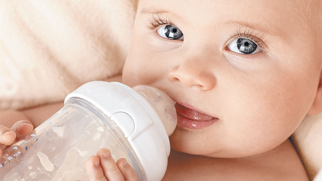 baby with bottle