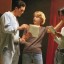 Actors rehearsing lines backstage