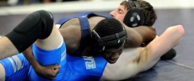 Man locking cradle on his opponent