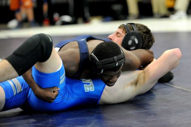 Man locking cradle on his opponent