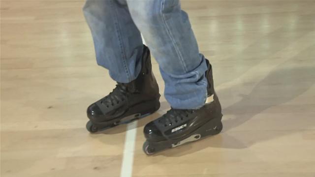 Man practicing on rollerblades