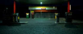 Empty Gas Station at Night