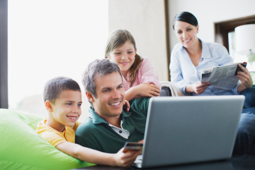 Family using laptop together