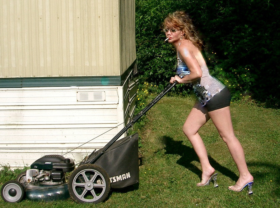 Lady using lawn mower