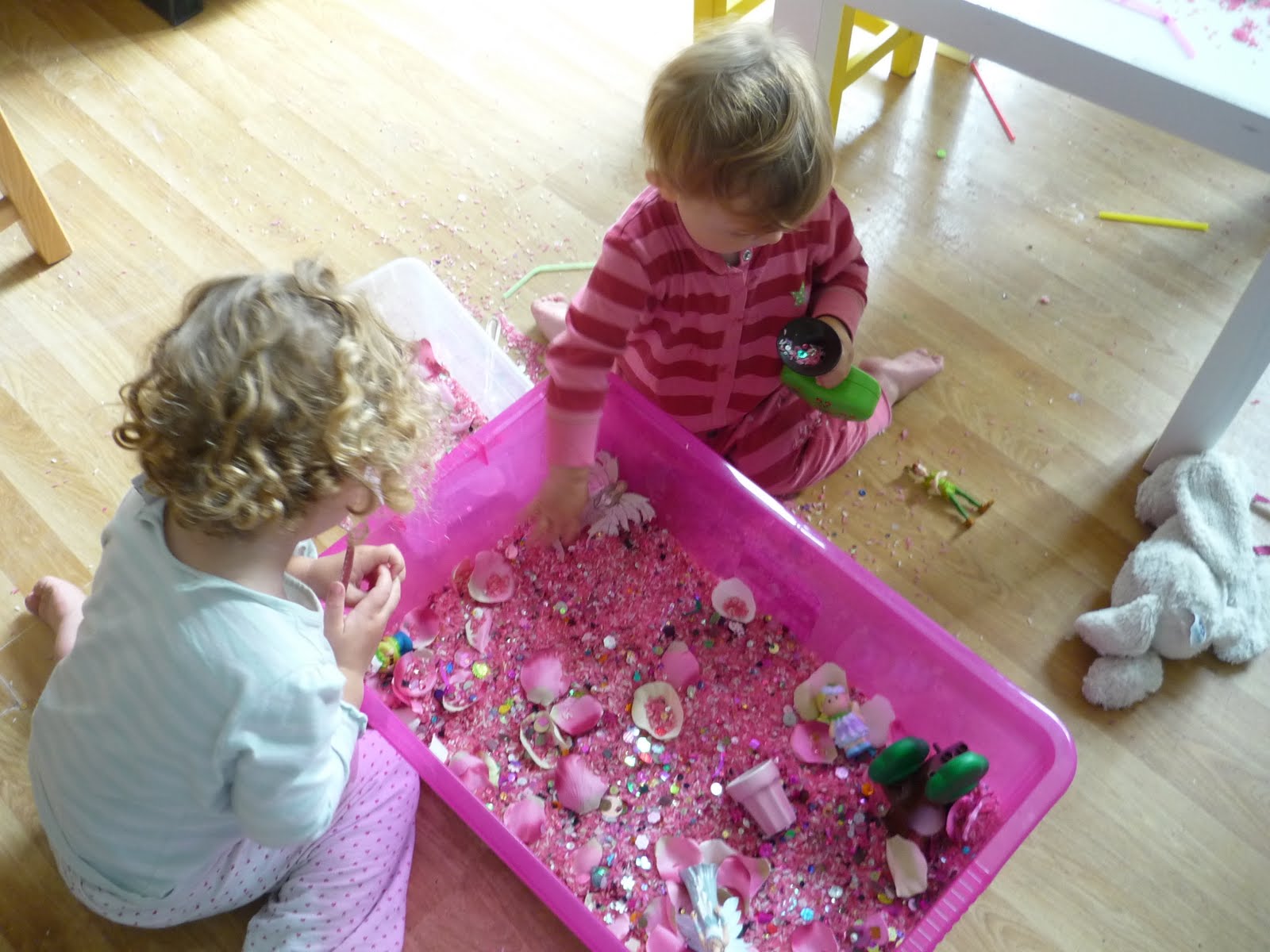 Children playing with a sensory tub