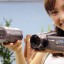 A girl with camcorder