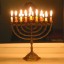 lighting an oil hanukkah menorah