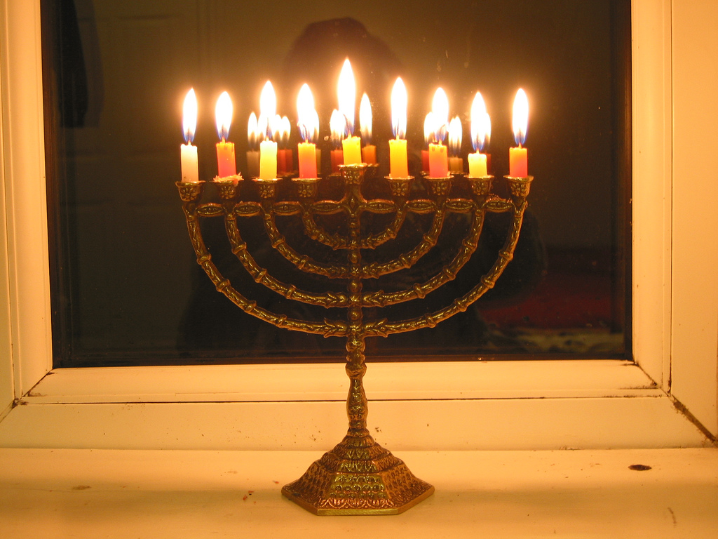 lighting an oil hanukkah menorah