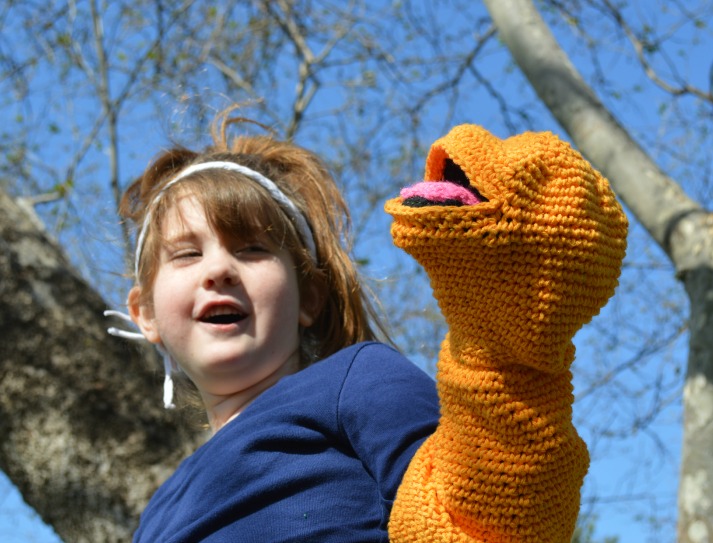 Girl controlling puppet
