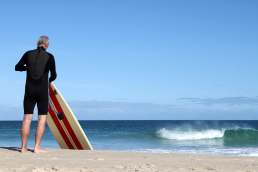 Longboard surfer getting ready