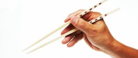 Hand holding Chopsticks