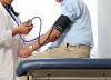 Man checking blood pressure