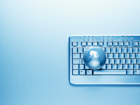 Computer keyboard and globe