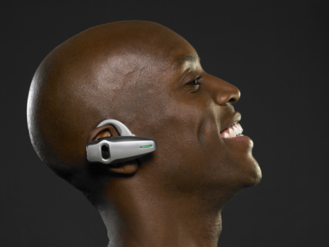 Man having Bluetooth Stereo Headset