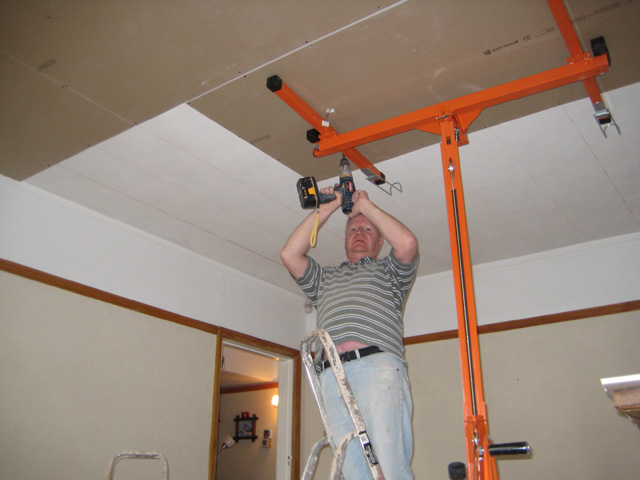 Man Building a Partition Wall