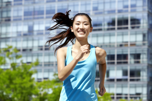 Smiling girl in running