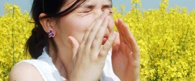 Women sneezing due to allergy