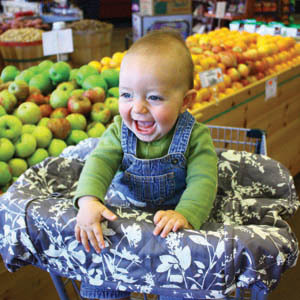 Baby smilling while shopping