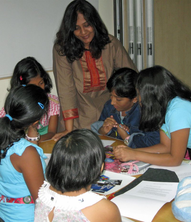 Teacher in class with students