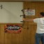 man tuning an Archery Bow