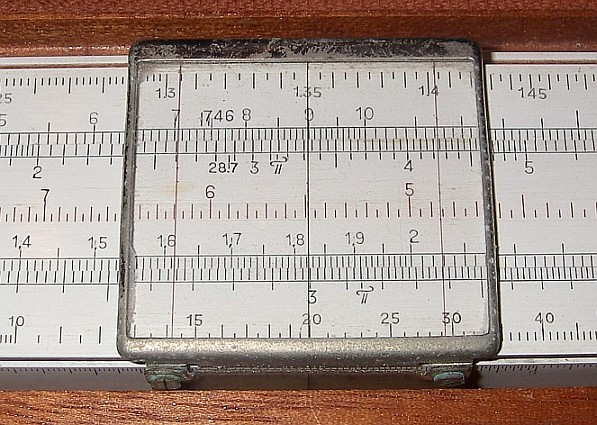 Slide Rule Performs mathematical calculations